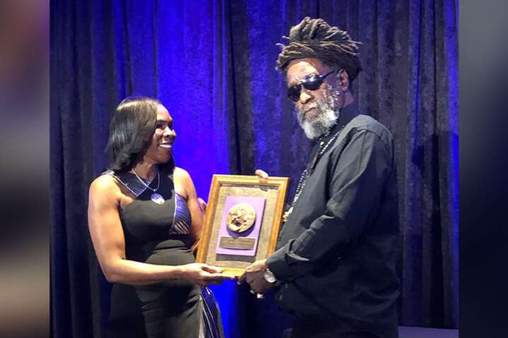 Black Uhuru's Duckie Simpson receiving his Marcus Garvey Lifetime Achievement Award at the JW Marriott in Washington, DC, last Friday.