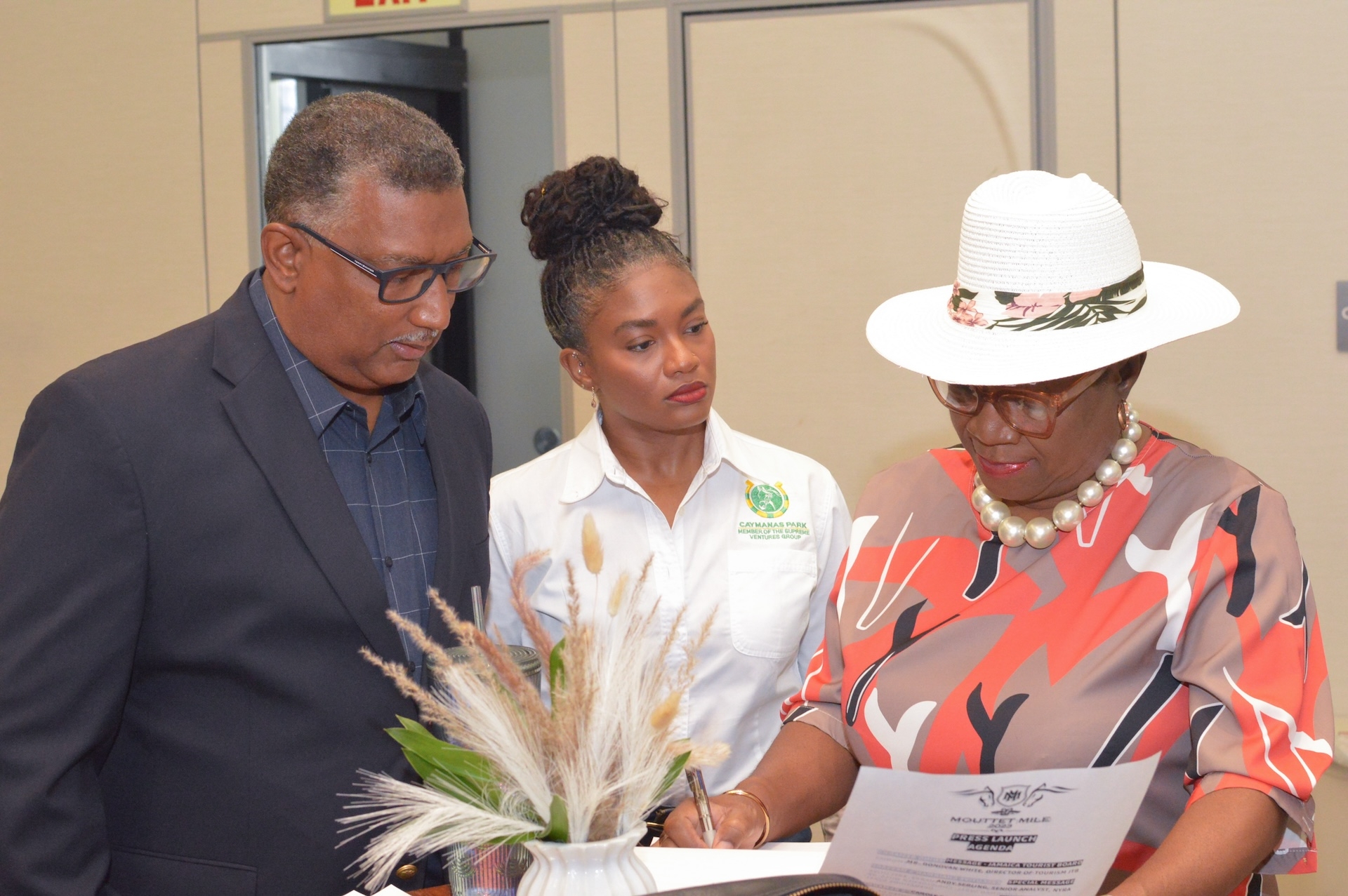 Supreme Ventures Racing and Entertainment Limited (SVREL) Racing Secretary, Denzil Miller (left), and Brand Optimisation Manager, Arielle Beckles (centre), join forces with Carole Beckford, consultant and master of ceremonies, at the press launch of the 2024 Mouttet Mile Invitational (GR.1) held on Tuesday at the AC Hotel.