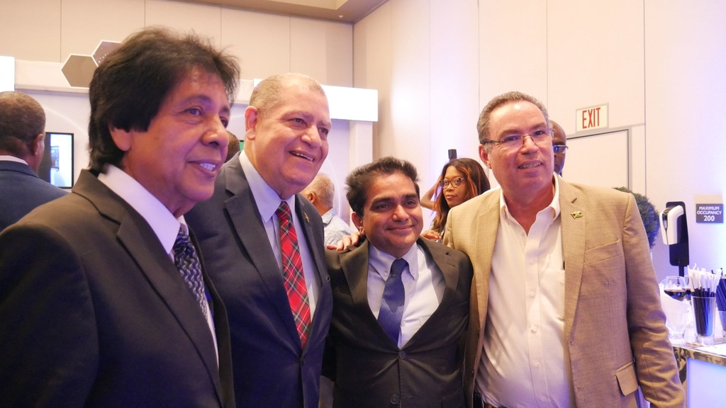 From left: Guardsman Executive Chairman Kenny Benjamin, Minister of Transport and Mining Audley Shaw, Guardsman Group Managing Director, Vinay Walia and Science and Technology Minister Daryl Vaz.