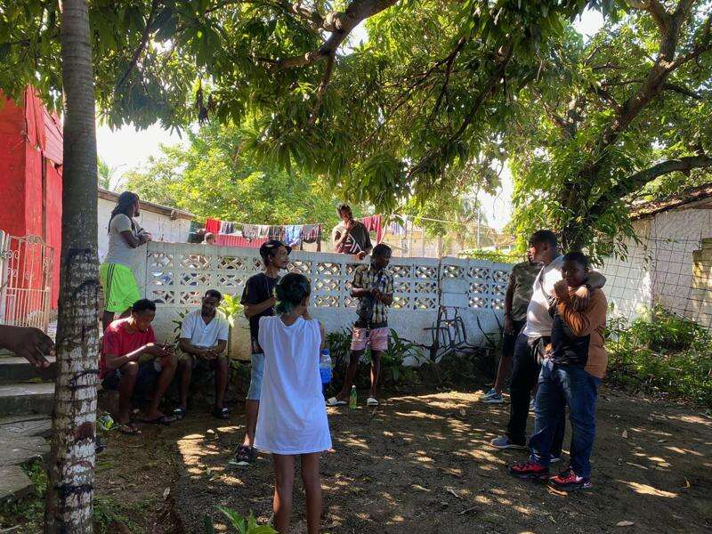 Residents of Content, St Ann discuss the tragic killing of Michelle Roache on Tuesday. (Photo: Akera Davis)