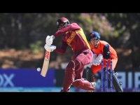 West Indies&#039; Brandon King plays a shot during the ICC Men&#039;s Cricket World Cup Qualifier Zimbabwe 2023 match against the Netherlands at Takashinga Cricket Club today in Harare, Zimbabwe. Looking on is Netherlands wicketkeeper and captain, Scott Edwards.