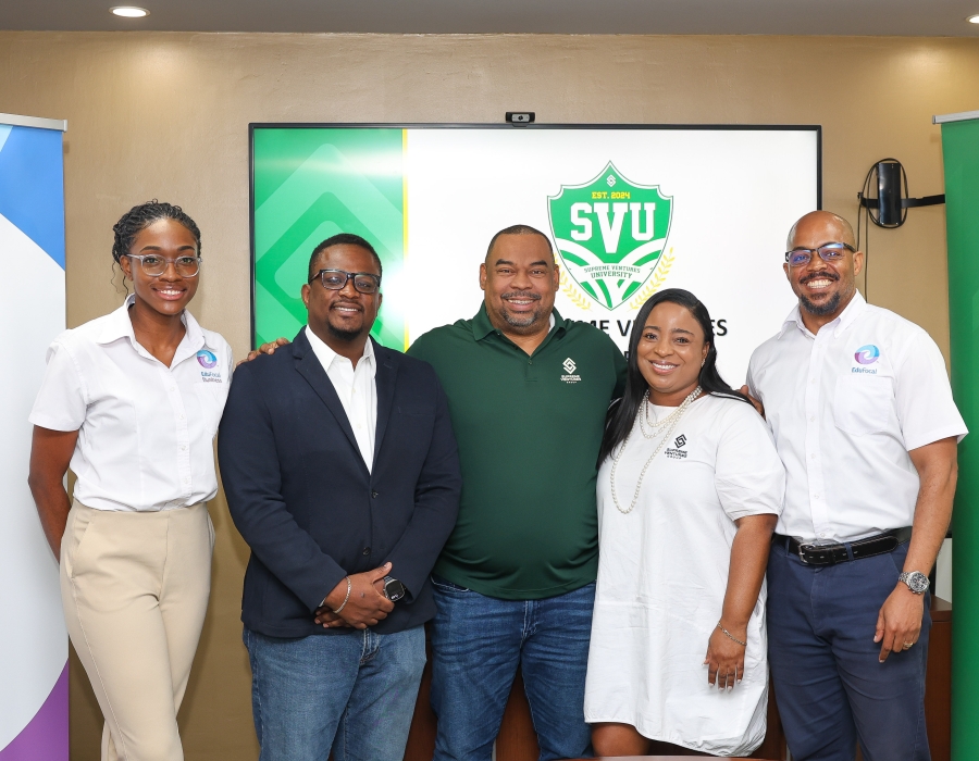  “Gary Peart, SVL Executive Chairman (centre) and Sasha-Kay Burke, SVL Head of HR  and Admin (2nd right) pose with EduFocal team members (L-R) Regina Taylor, General Manager – EduFocal Business, Gordon Swaby, CEO and Mark Green, Chief Operating Officer at the recent launch of Supreme Ventures University.”