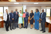 GOJ COMPENSATION OFFER ACCEPTED BY PUBLIC SECTOR BARGAINING GROUPS: Hon. Nigel Clarke (4 th right), DPhil., MP, Ministry of Finance and the Public Service presents the signed MOU to Helene Davis Whyte (4 th left), President, Jamaica Confederation of Trade Unions (JCTU) on Tuesday, November 15, 2022. Looking on are Hon. Marsha Smith (3 rd right) MP, State Minister, Darlene Morrison ( 2 nd right) CD, Financial Secretary, Wayne Jones (right), Deputy Financial Secretary, Maria Thompson Walters (left), Executive Director, Transformation Implementation Unit (TIU), Senator Kavan Gayle (2 nd left), President, Bustamante Industrial Trade Union (BITU) and Oniel Grant (3 rd left), President, Jamaica Civil Service Association (JSCA).