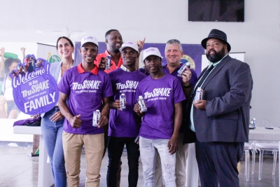 Celebrating a momentous occasion are (front row left to right) Jockeys Reyan Lewis, Tevin Foster and Javaneil Patterson, alongside Supreme Ventures Racing and Entertainment Limited (SVREL) Chairman, Solomon Sharpe, with (back row left to right) Trade Winds Citrus Limited’s Marketing Manager Lauren Mahfood, VP of Operations of Supreme Ventures Racing and Entertainment Limited (SVREL) Christopher Wills and Trade Winds Citrus Limited’s Managing Director Peter McConnell, on Tuesday during the TruShake Jockey Sponsorship Press Conference at Caymanas Park.