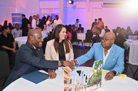 Minister of Tourism, Hon. Edmund Bartlett (right) shares a quick word with Minister of Industry, Investment and Commerce, Sen. the Hon. Aubyn Hill (left) and Ambassador of the Dominican Republic to Jamaica, H.E. Angie Shakira Martinez Tejera ahead of his address at the inaugural 'Keys to LATAM' Conference held at the Spanish Court Hotel on September 7.