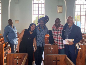 (From left) Keyboardist Bowie McLaughlin, Donna Reid from duo Althea &amp; Donna, singer David Hinds, engineer/producer Delroy Fatta Pottinger, and impresario Tommy Cowan at the funeral of Wailers keyboardist Tyrone Downie held at the Kingston College Chapel on North Street recently.